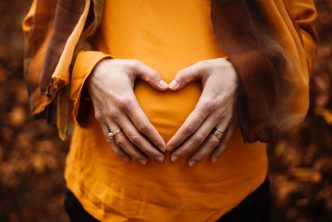 person touching stomach