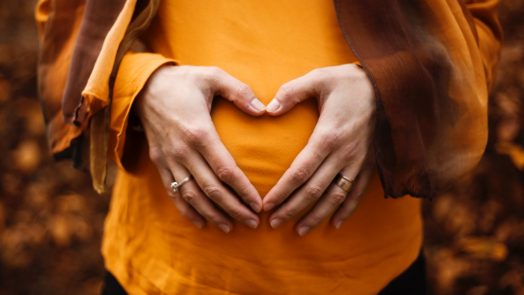 person touching stomach