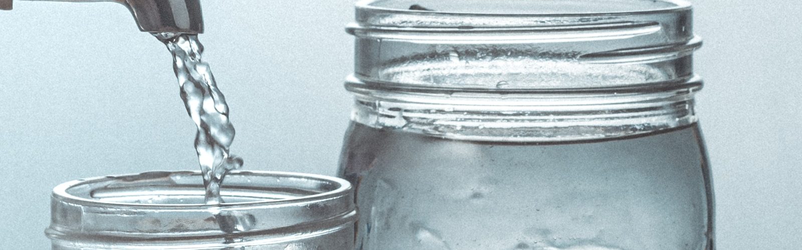 clear glass jar with water
