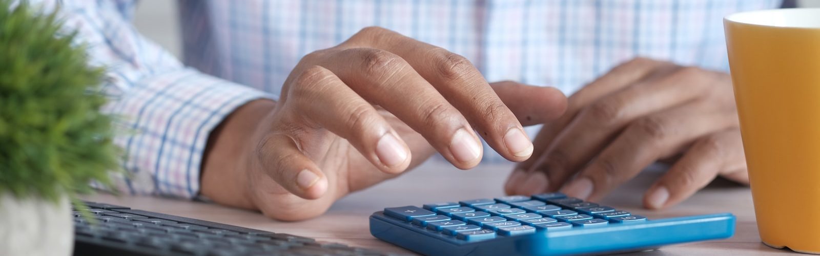 person using black computer keyboard