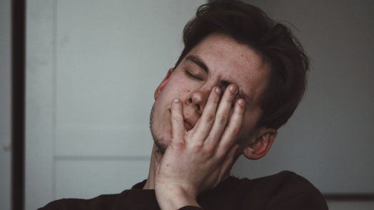 man wearing black crew-neck top