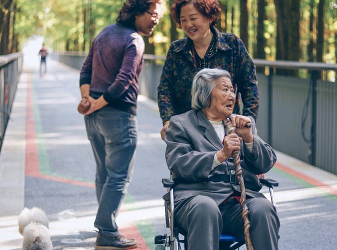 woman sitting on wheelchair